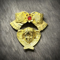 Brass pendant "Cherubic Charm" with red crystal