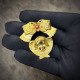 Brass pendant "Cherubic Charm" with red crystal