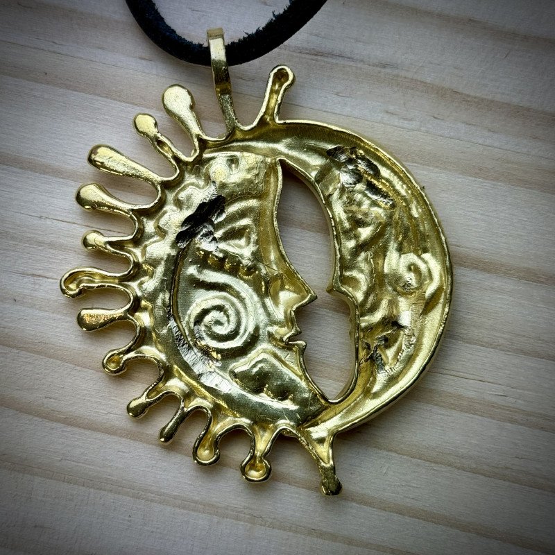 Author's pendant "Sun and Moon" made of brass