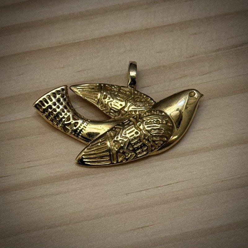 Author's brass pendant "Golden Swallow"