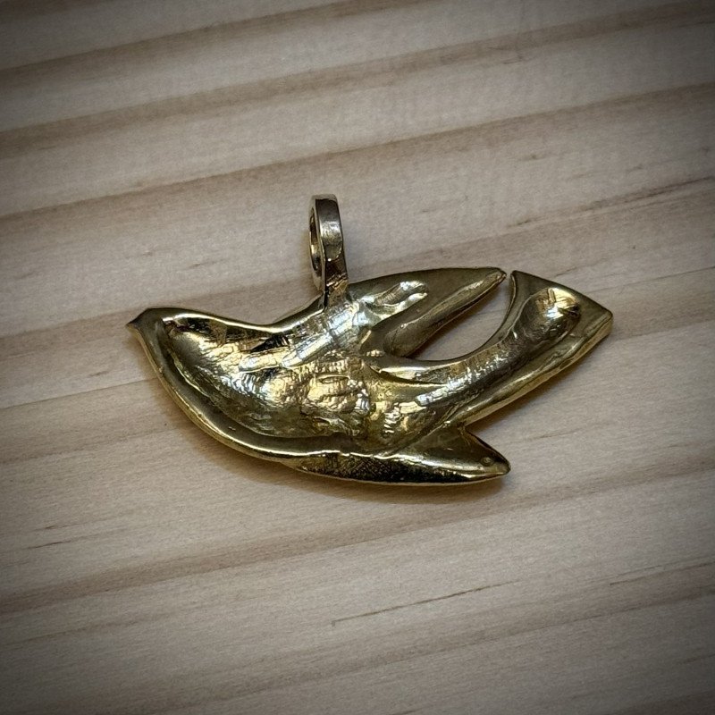 Author's brass pendant "Golden Swallow"