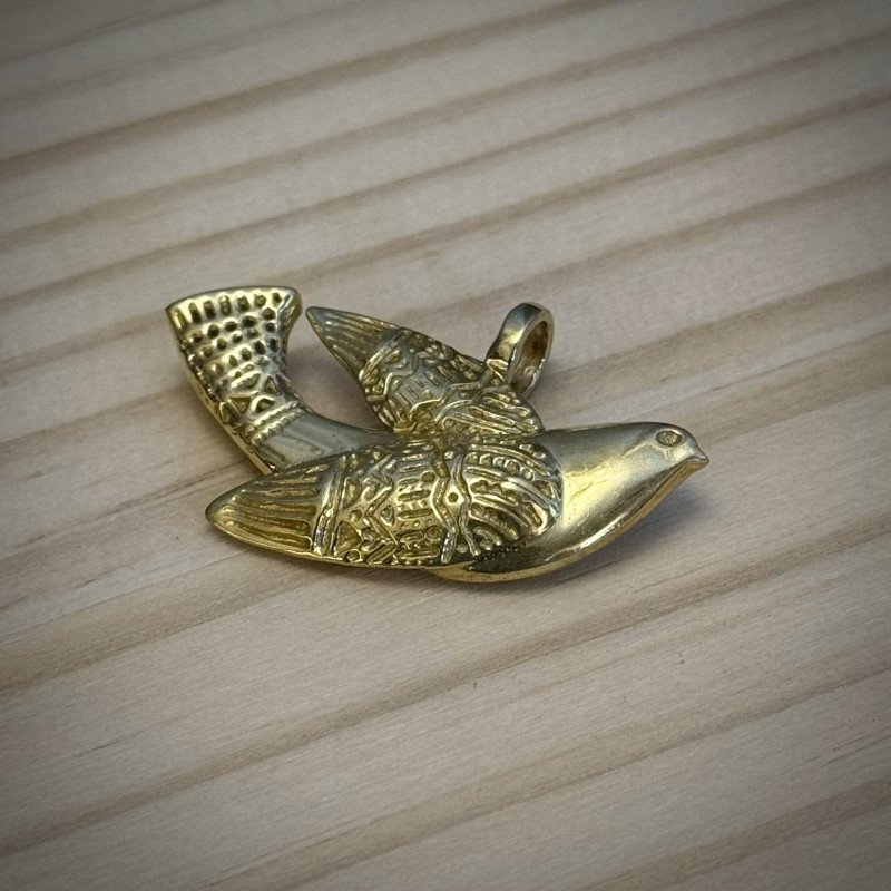 Author's brass pendant "Golden Swallow"